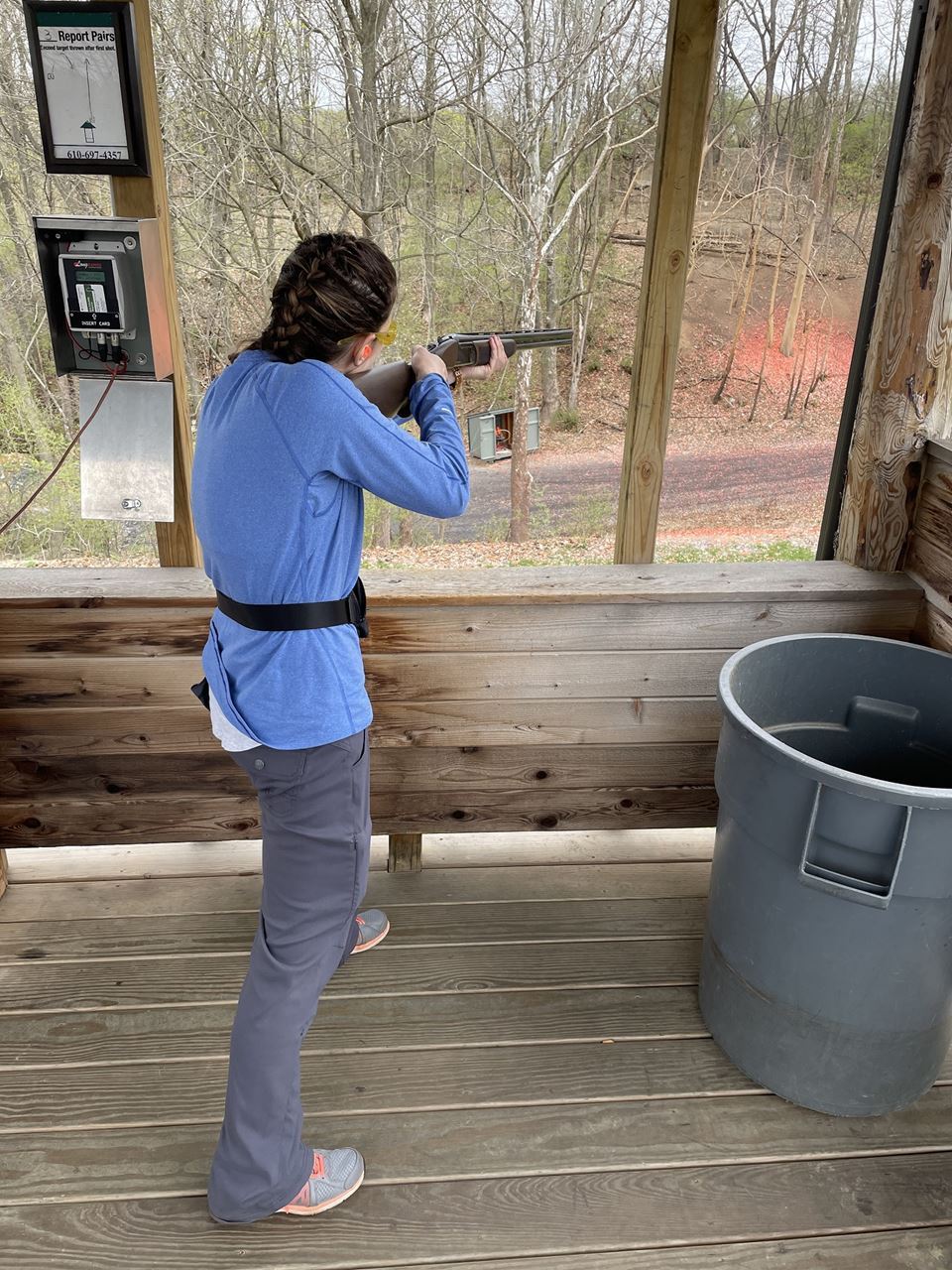 Female Shooting Sporting Clays with Shotgun